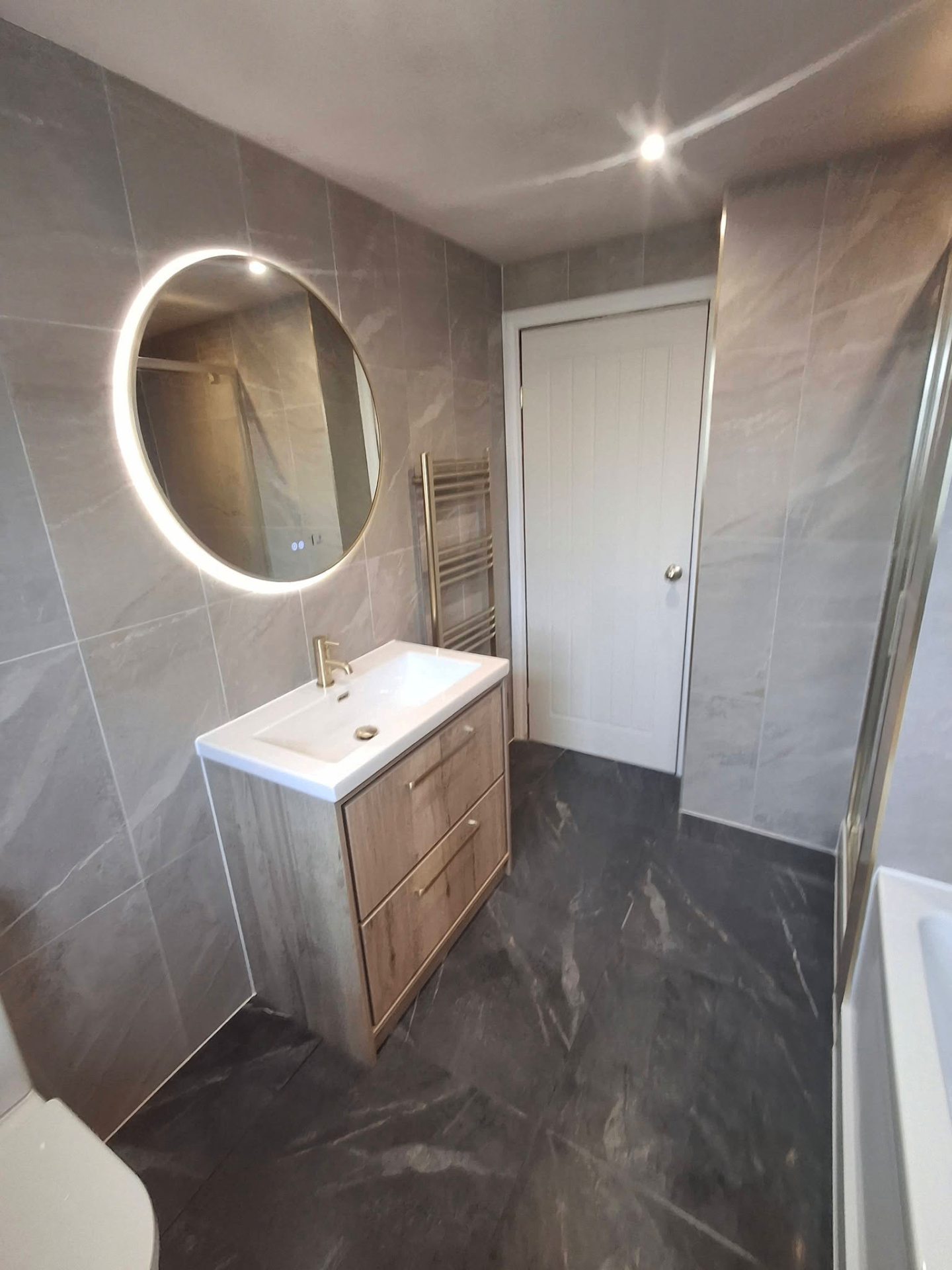 Grey Marble Bathroom with Brushed Gold Fittings